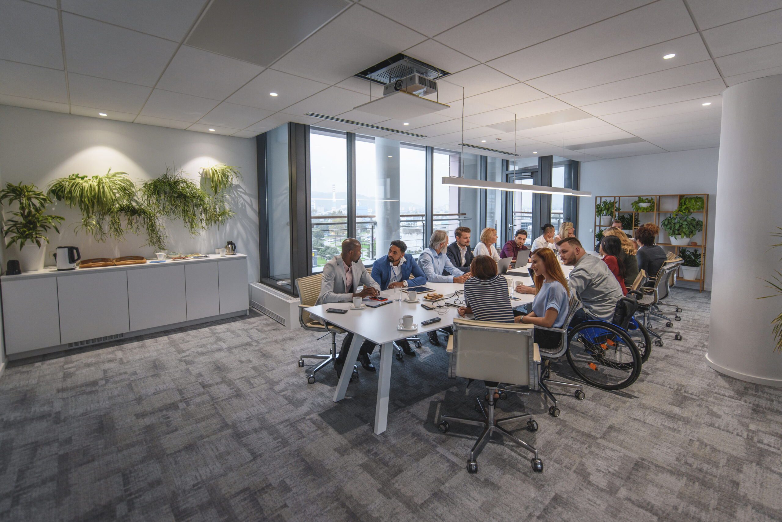 Executive team meeting at a table.