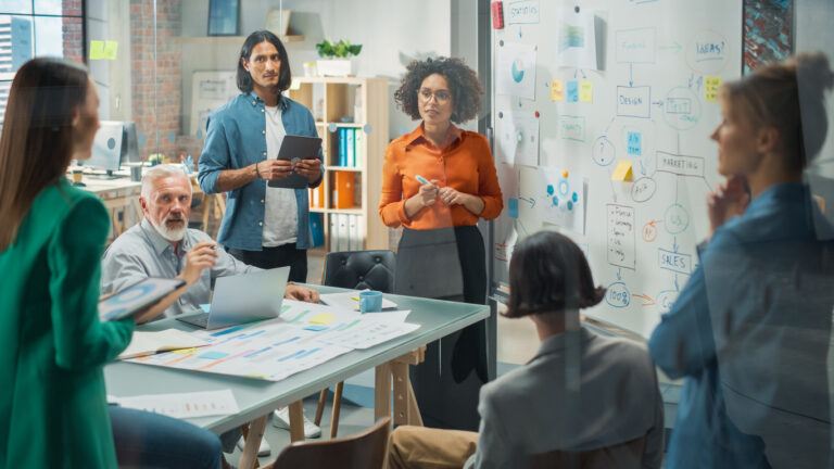 a group of people in a meeting